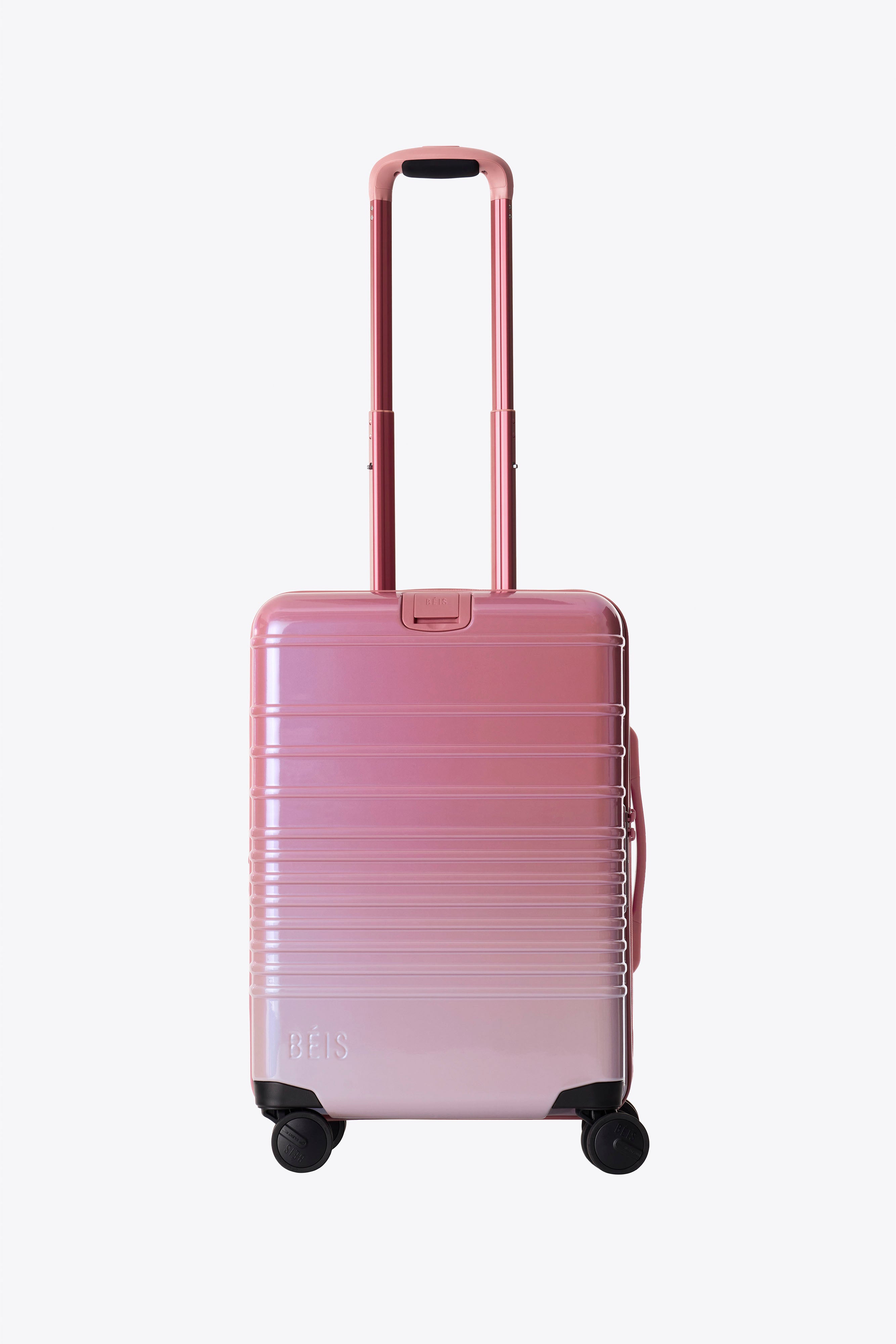 The Carry-On Roller in Wicked Pink