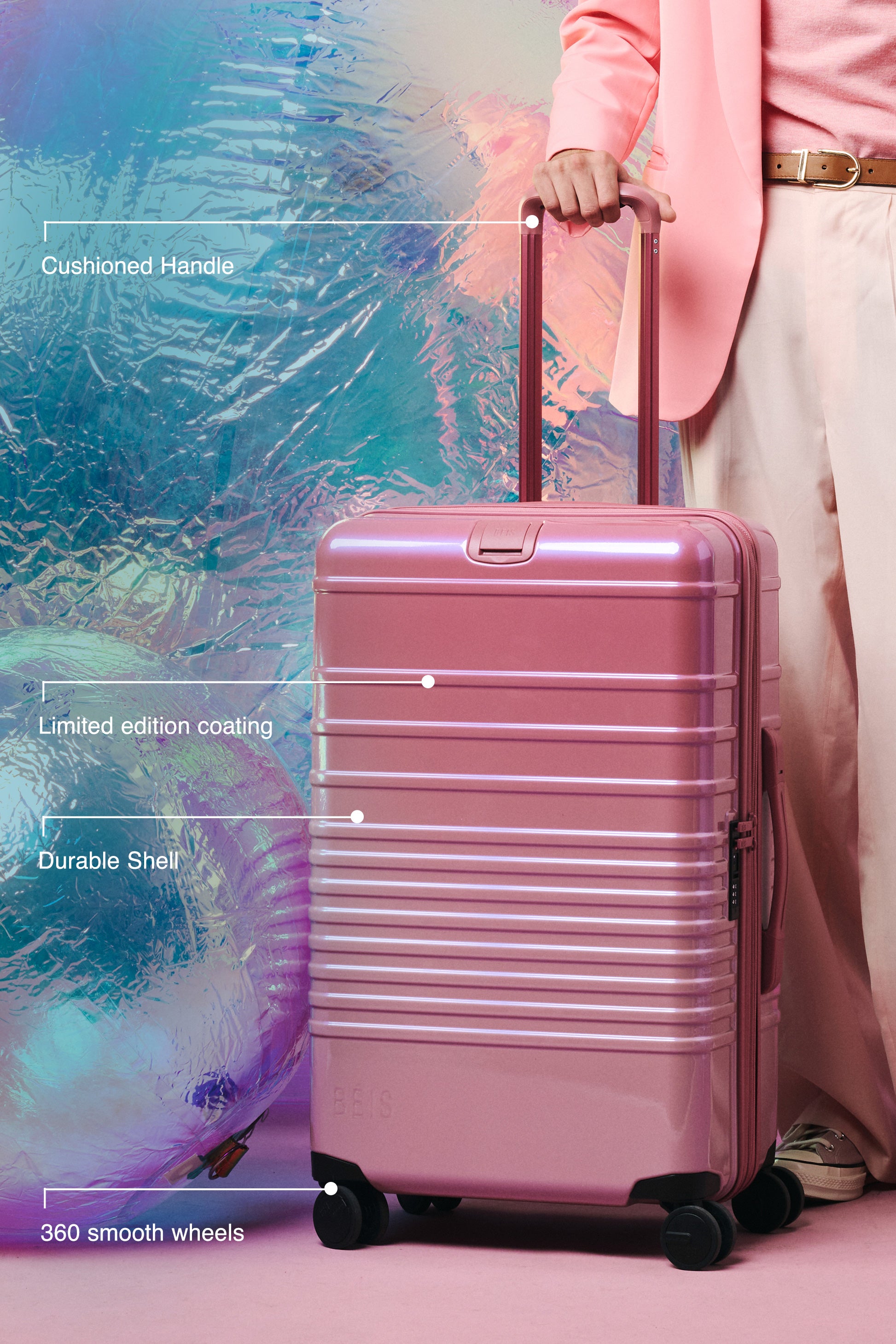 The Carry-On Roller in Wicked Pink