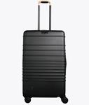 The Medium Check-In Roller in Black